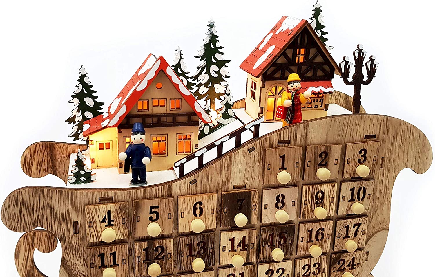 Detail dreveného adventného kalendára sane s číslovanými zásuvkami