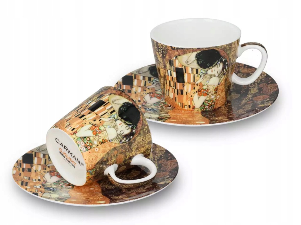 Porcelánové šálky Carmani s motívom obrazu Bozk od Gustava Klimta, jedna otočená na bok